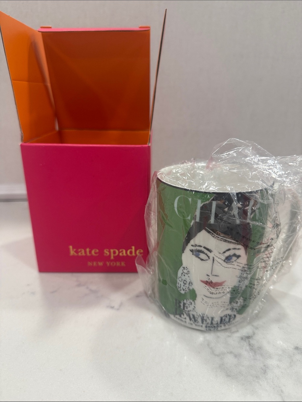 Kate Spade make headlines be jeweled mug